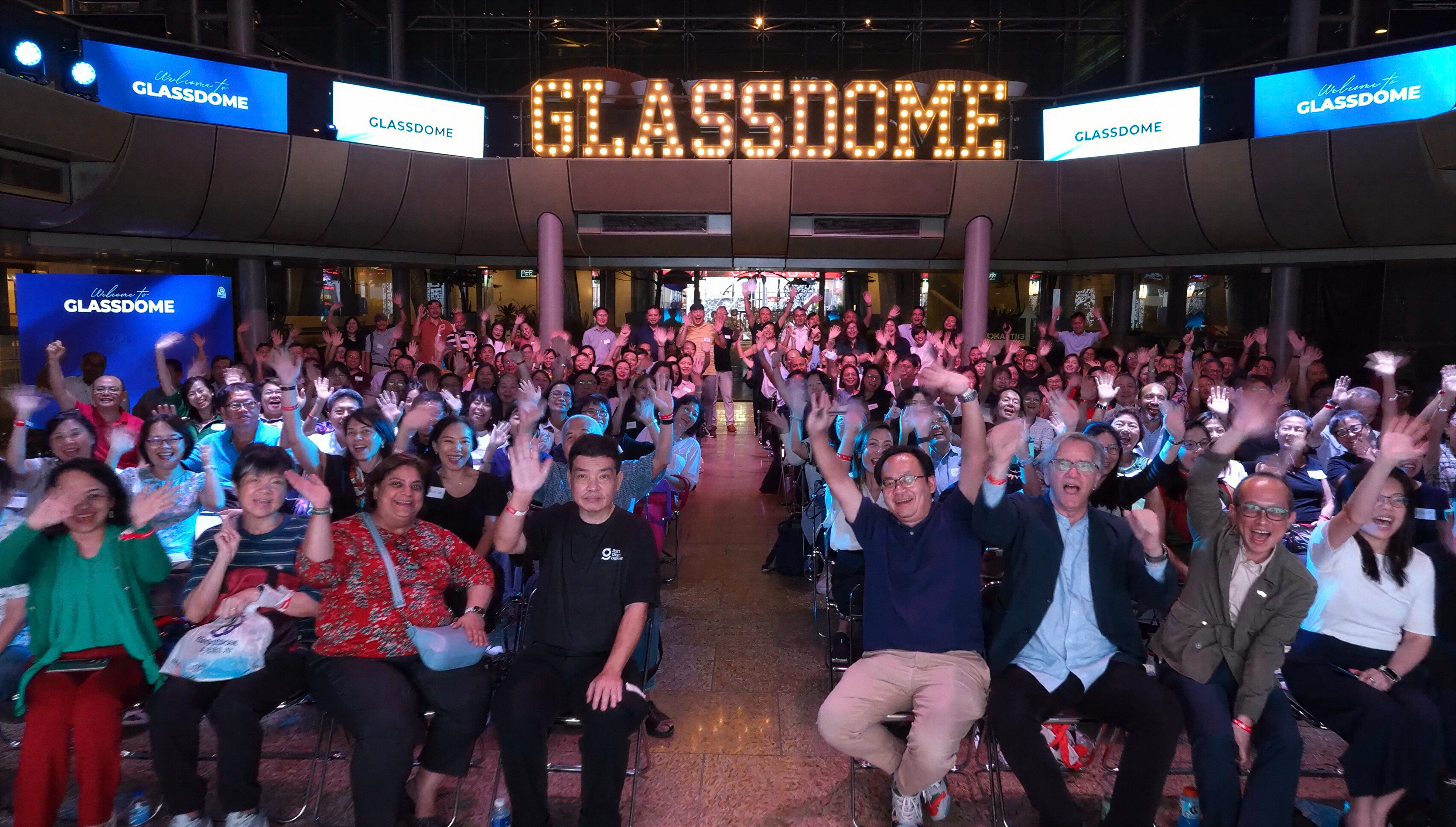 Woman looking thoughtfully through leaves